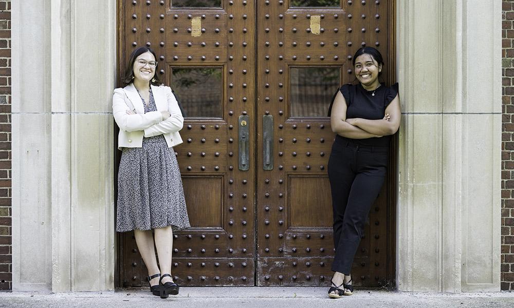 Mara Criollo-Rivera (RIGHT) and Kristel Kezia Sagabaen Layugan are pictured outside Dewey Hall.